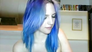 Blue haired girl plays with tits