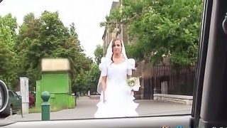 Sexy girl in a wedding dress playing with a stranger's cock in the car